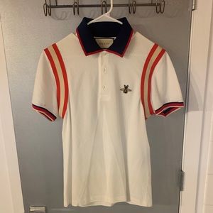 Gucci white shirtsleeved collard shirt.